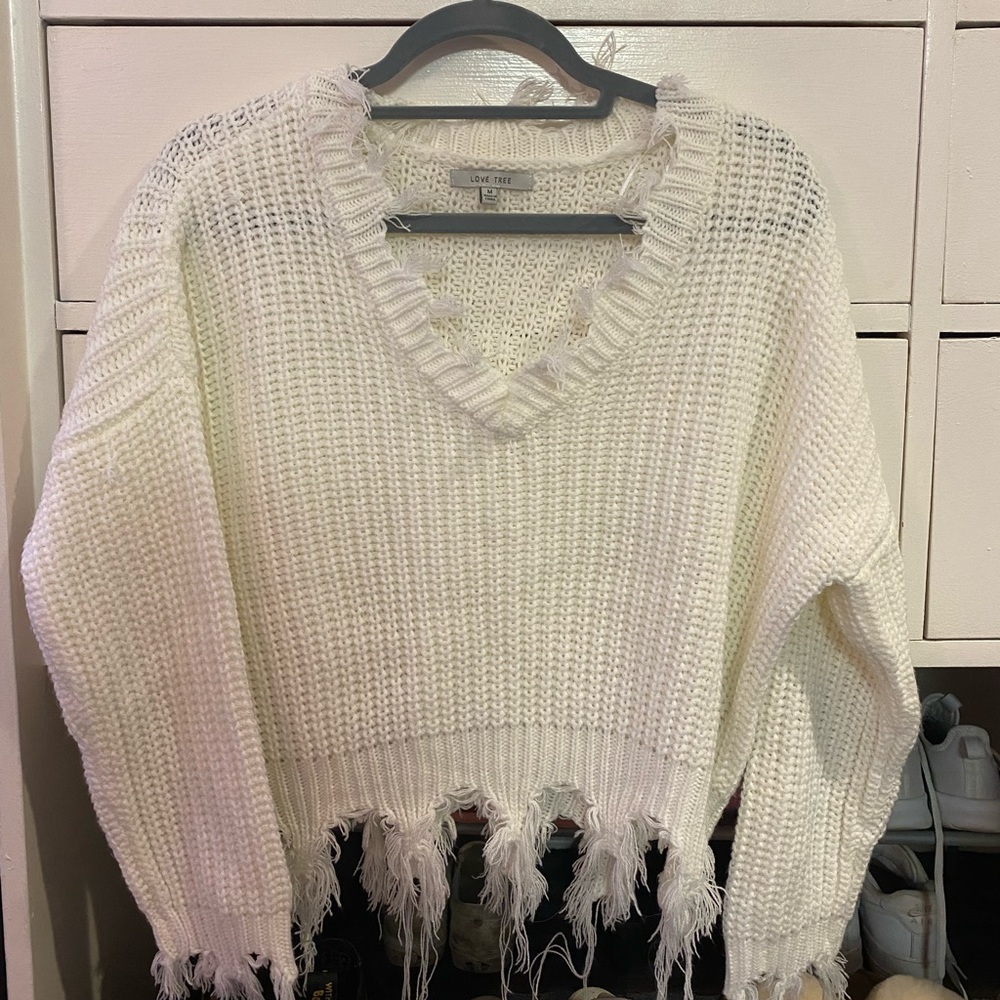 White distressed sweater